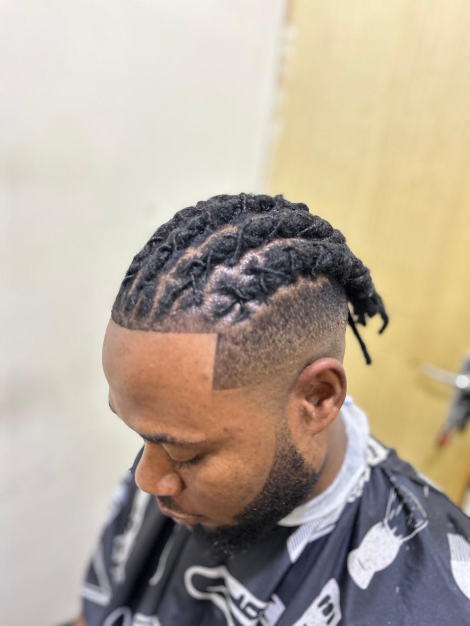 Premium locs styling Dubai — two-strand twist